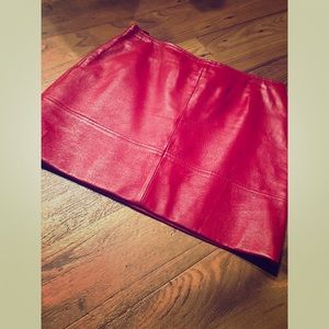 Red leather mini skirt, zipper in back